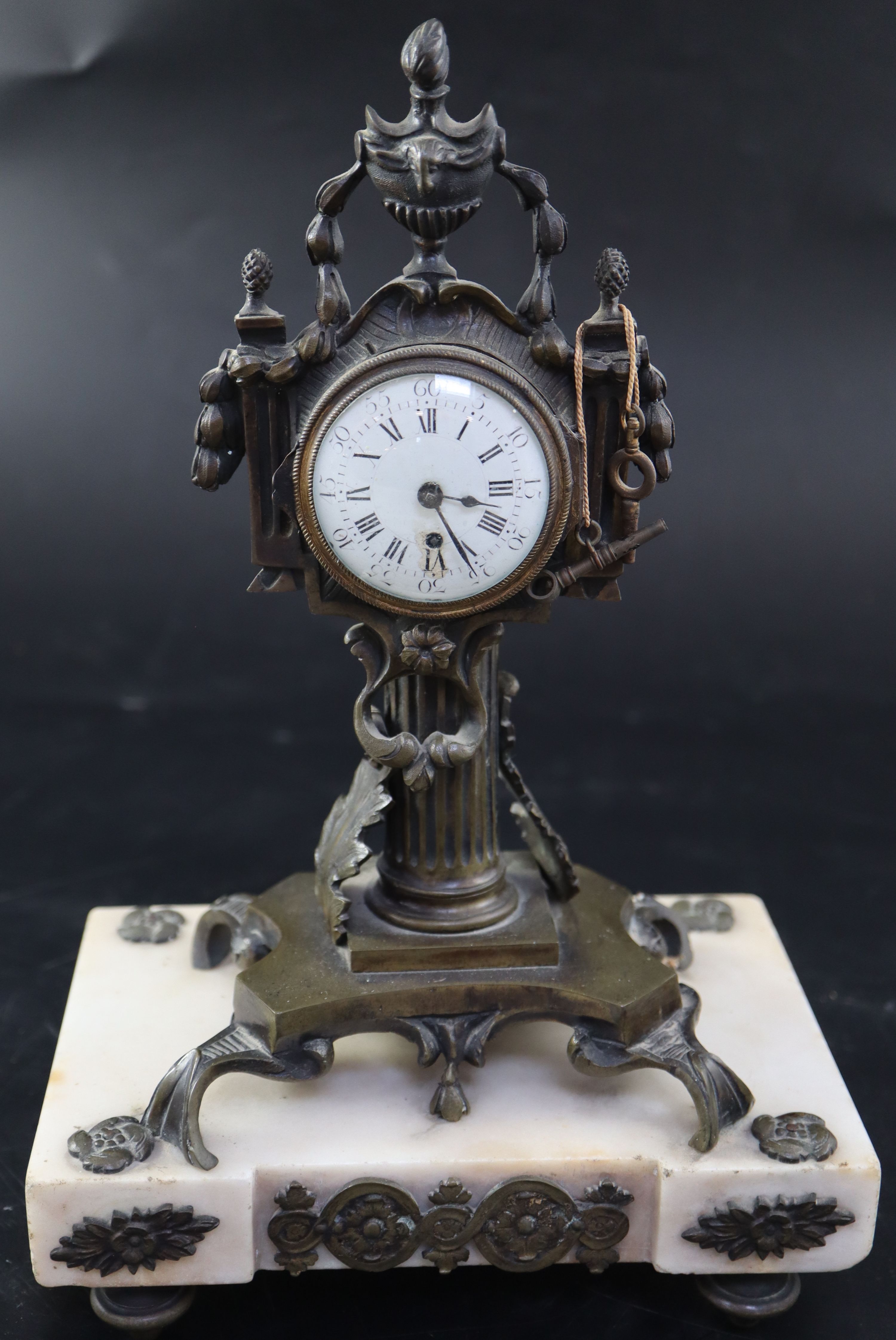 A late 18th century French marble and bronze mantel timepiece, height 30cm